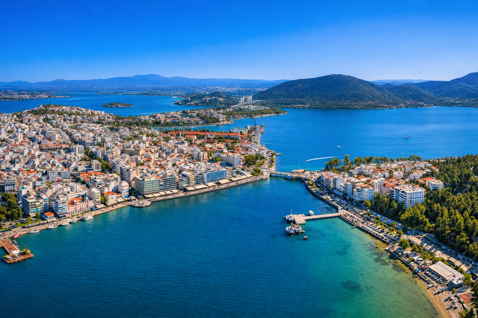 Aerial view of Chalkida, Greece, showing the coastline, sea passages, mainland and surrounding islands